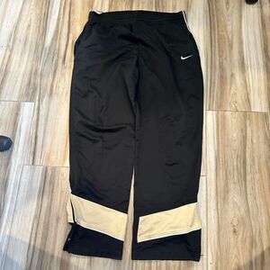 Black and gold y2k baggy vintage Nike track pants